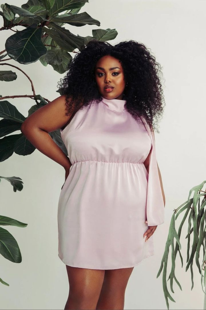 Model wearing Hilary MacMillan bowed halter dress