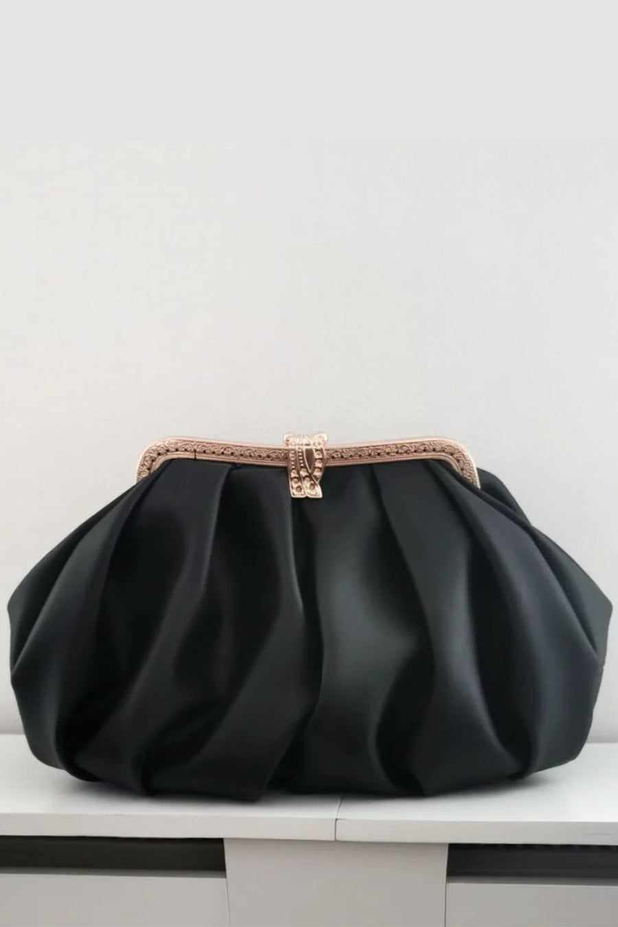 Ebony Cross Semorah black vegan leather clutch