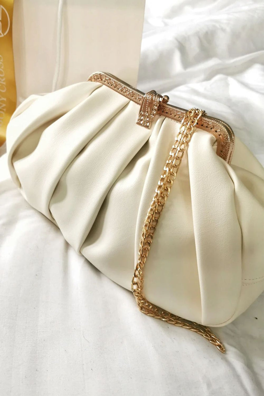 Semorah cream vegan leather clutch