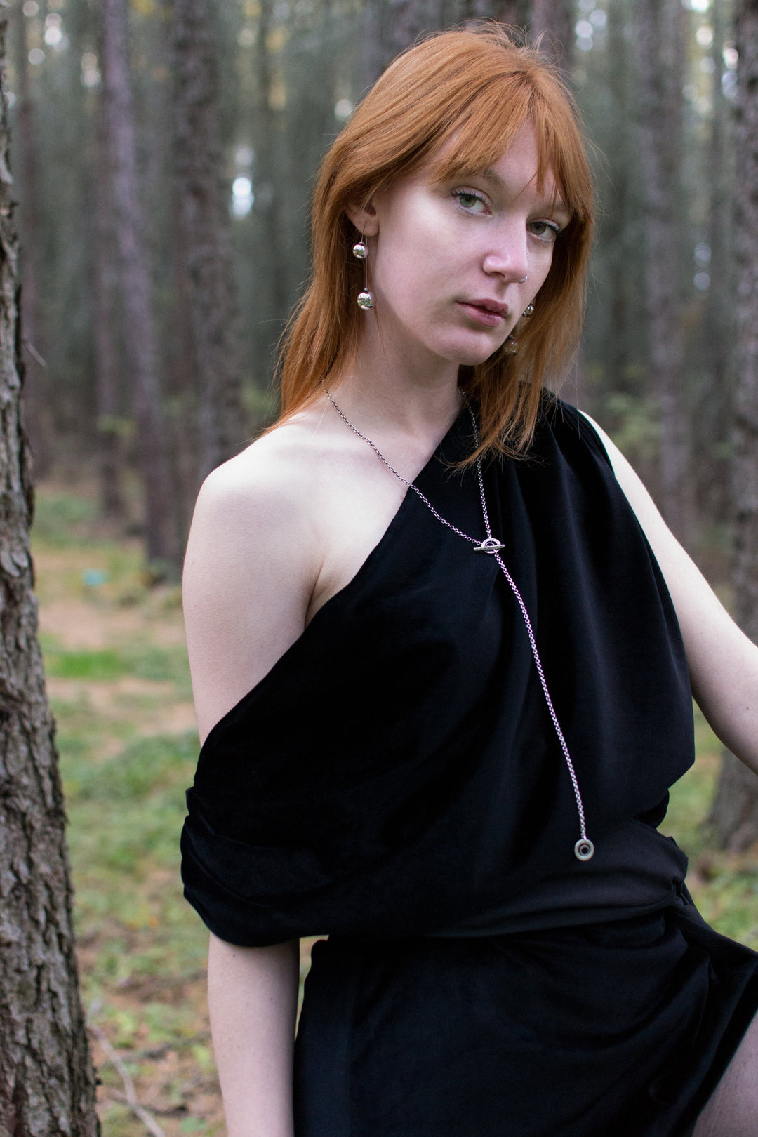 Black velvet asymmetric off shoulder mini dress