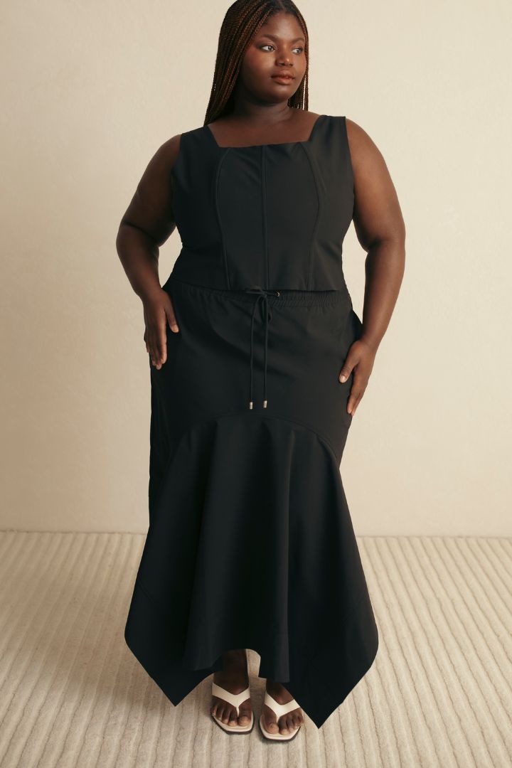 Hilary MacMillan black corset top with a skirt