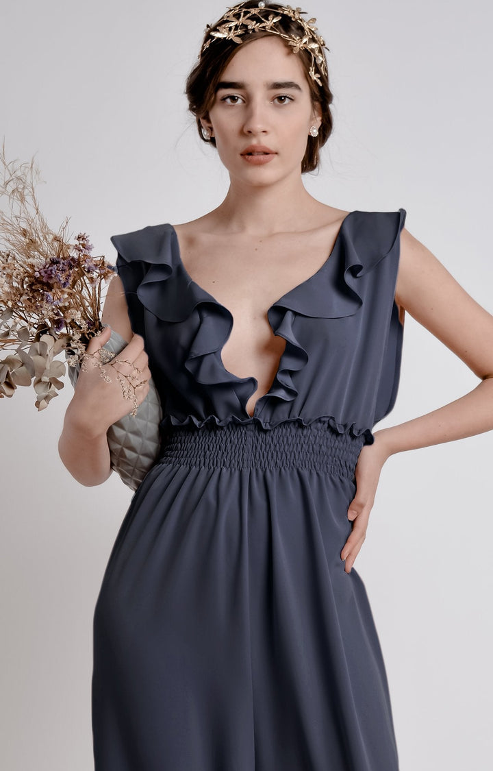 Midnight blue wide leg, sleeveless jumpsuit with ruffle and smocking details