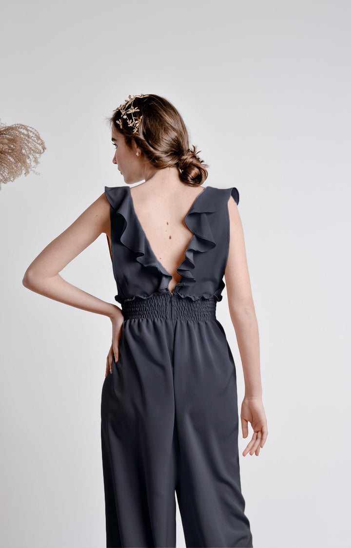Midnight blue wide leg, sleeveless jumpsuit with ruffle and smocking details